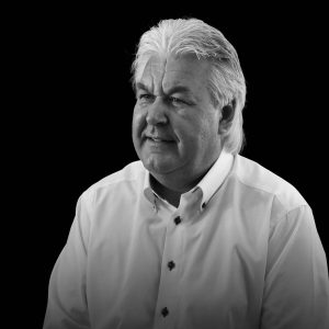 Black and white headshot of Paul Wonnacott, Managing Director at Vectair Systems